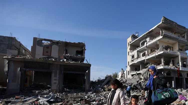 Palestinians in Gaza use truce to pick through rubble of homes