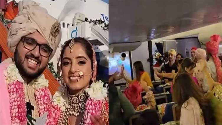 Indian couple ties the knot on plane amid mid-air festivities