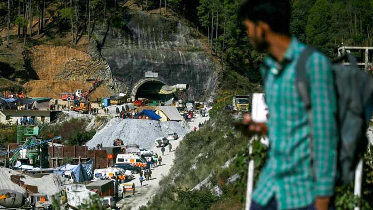 Indian army digs by hand to free 41 trapped tunnel workers