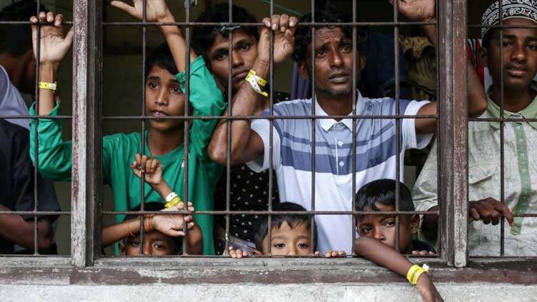 Gangs, extortion in Bangladesh camps driving Rohingya sea exodus