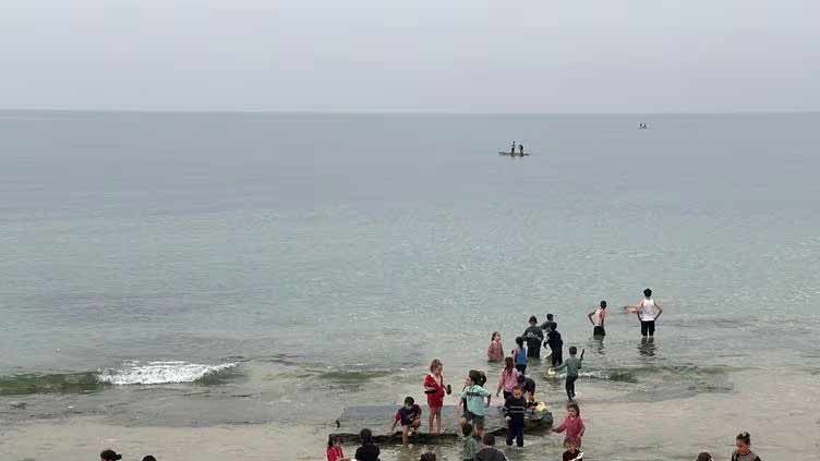 Tears and laughter on Gaza beach as children get break from war