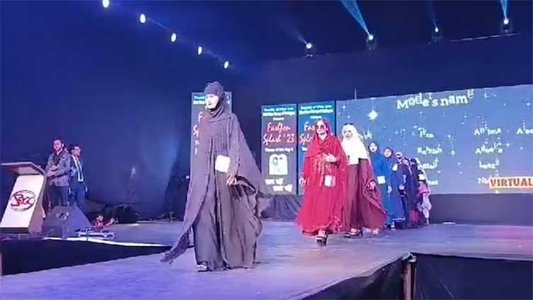 Burqa-clad women walk the ramp in UP college