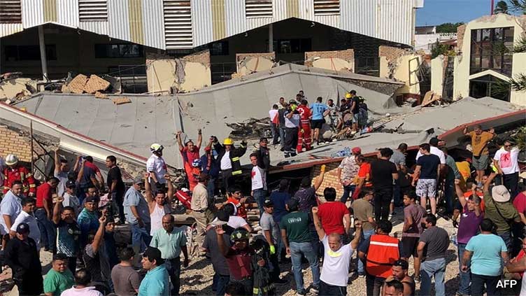 Mexican church roof collapses during Sunday mass killing 9, about 30 others missing