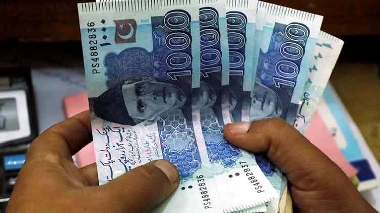 PKR continues to weaken dollar in interbank, open market 