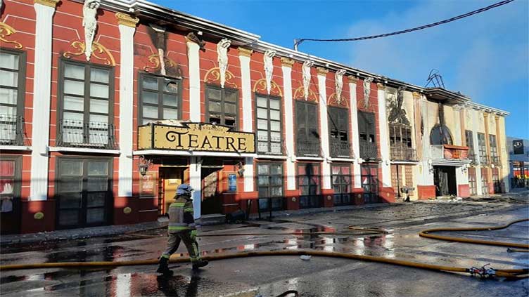 Firefighters search wreckage of deadly Spain nightclub fire