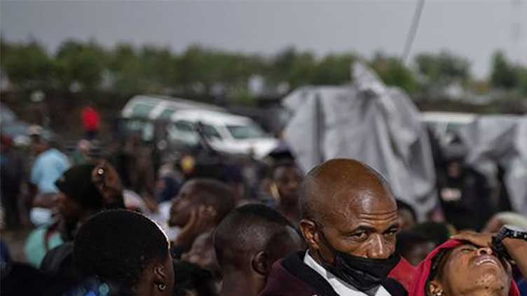 At mass burial, Congolese families weep for victims of protest killings