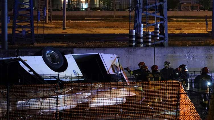 At least 21 dead after Italian bus carrying tourists falls from Venice overpass