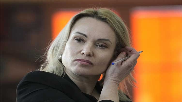 Former Russian state TV journalist gets 8 1/2-year sentence in absentia for Ukraine war criticism