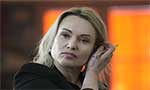 Former Russian state TV journalist gets 8 1/2-year sentence in absentia for Ukraine war criticism