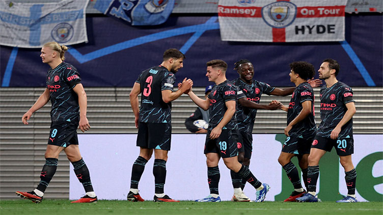 Alvarez and Doku strike late to push Man City past Leipzig