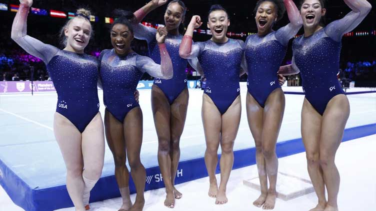 Biles wins 20th world title as US women seal team gold