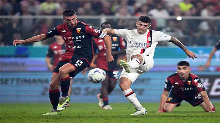 Milan go top with late Pulisic strike at Genoa as Giroud ends match in goal