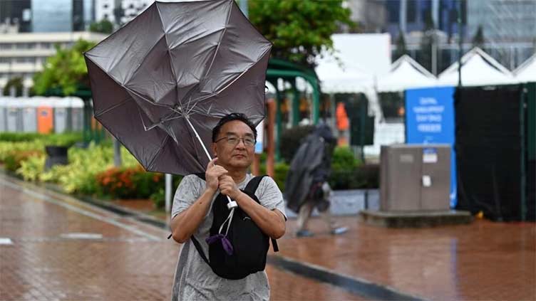 Hong Kong halts trading, closes schools post-typhoon