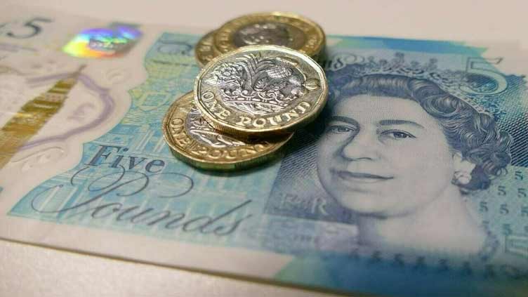 Sterling falls versus dollar but not far from 1-1/2 week high