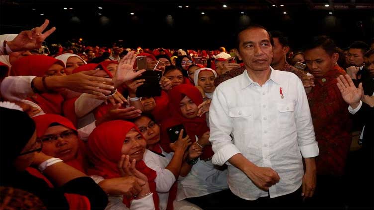 Jokowi, Indonesia's kingmaker, works to keep influence after election