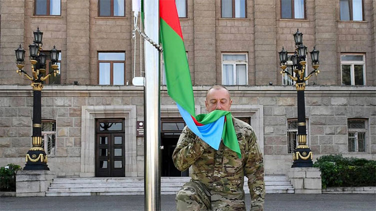 Azerbaijan's president raises national flag in Nagorno-Karabakh capital