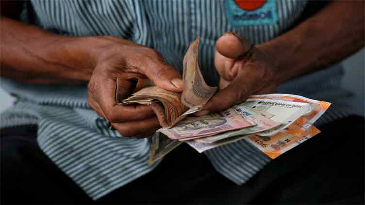 Indian central bank likely selling dollars to keep rupee off record low 