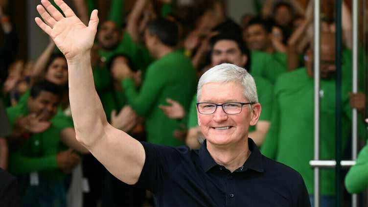Apple CEO Tim Cook makes surprise visit to China
