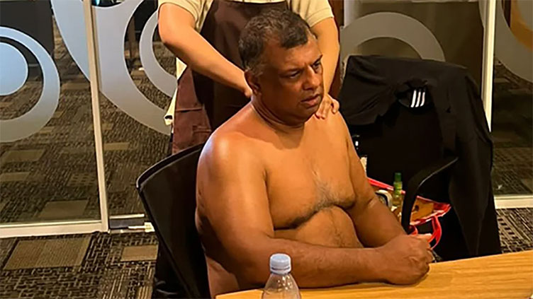 AirAsia chief criticised after posting shirtless massage photo on LinkedIn