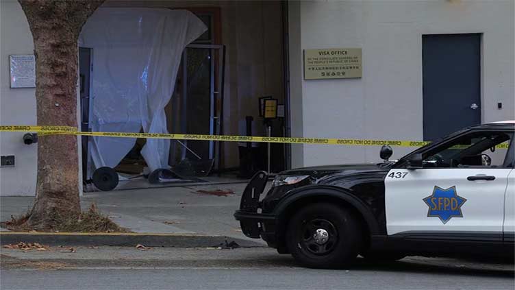 Driver who crashed into Chinese consulate carried knife, crossbow