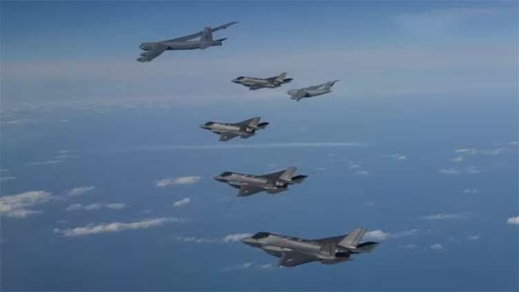 South Korea says holds first joint air drill with Japan and US