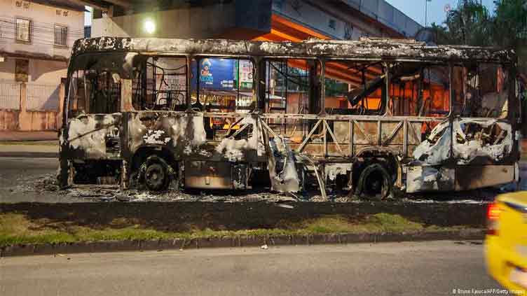 Rio gangsters torch at least 35 buses after Brazil crime boss killed