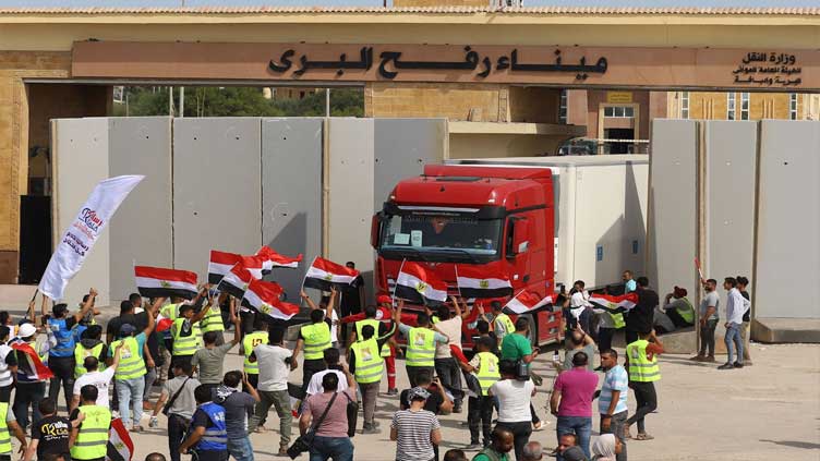 Medical team and aid trucks enter Gaza via Rafah crossing - Palestinian border official