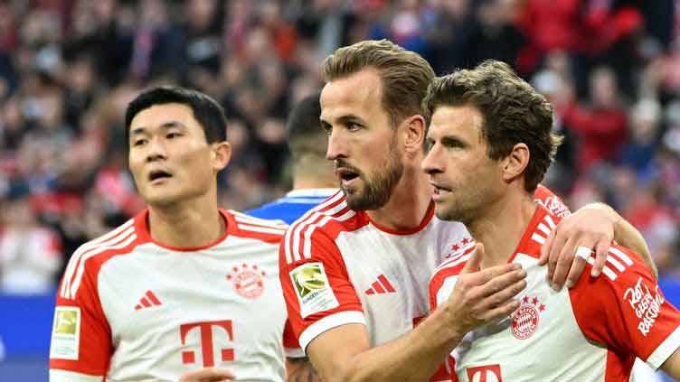 Bayern crush Darmstadt 8-0 with Kane hat-trick amid sea of red