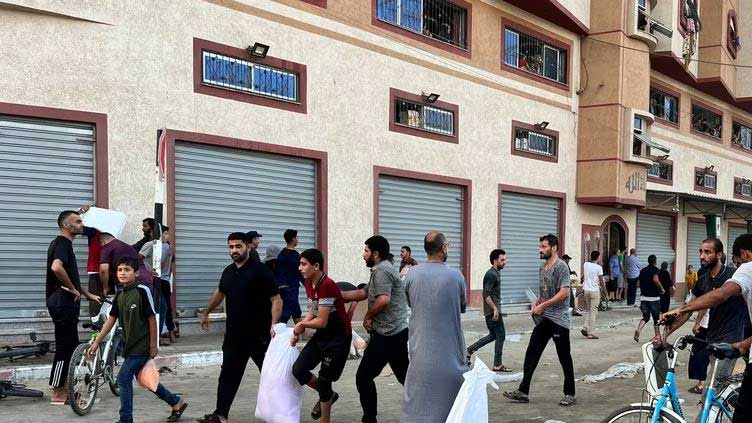 Gazans break into aid centres, taking flour and supplies, UN says