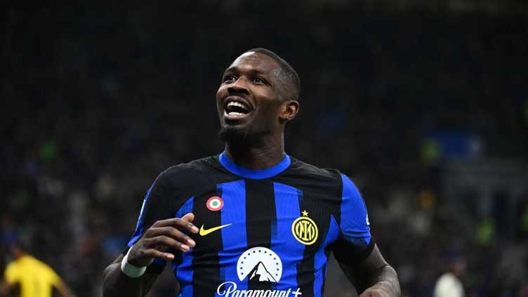 Thuram gives leaders Inter revenge on Lukaku as Napoli draw with Milan