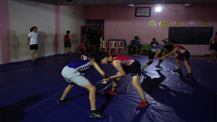 Indian school for wrestling helps women chase life and glory