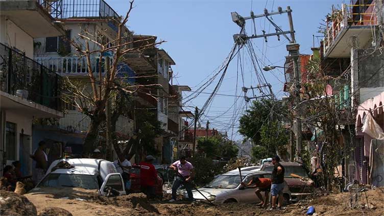 Nearly 100 dead or missing in Mexico from hurricane, food and water worries persist