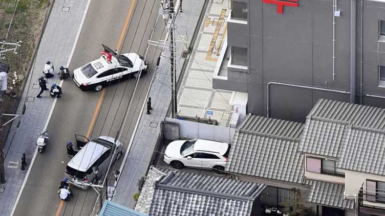 Suspected gunman takes hostages in Japanese post office 