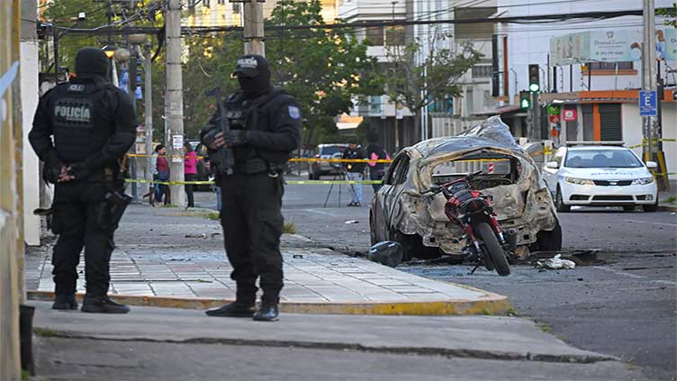 Car bombs rock Ecuador capital as prisoners seize 57 guards, police