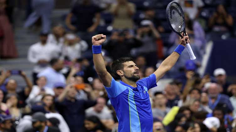 Djokovic fights back from two sets down to reach U.S. Open final 16