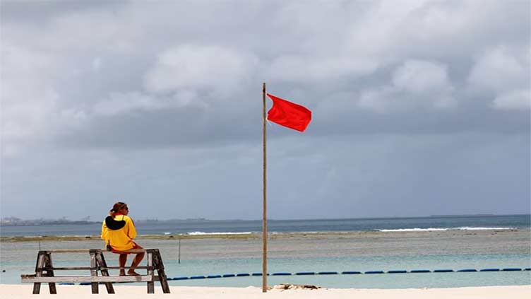 Typhoon Haikui prompts Taiwan to evacuate thousands, cancel flights