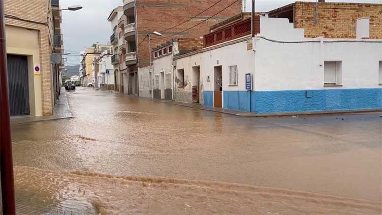 Madrid residents told to stay at home as torrential rain sweeps across Spain