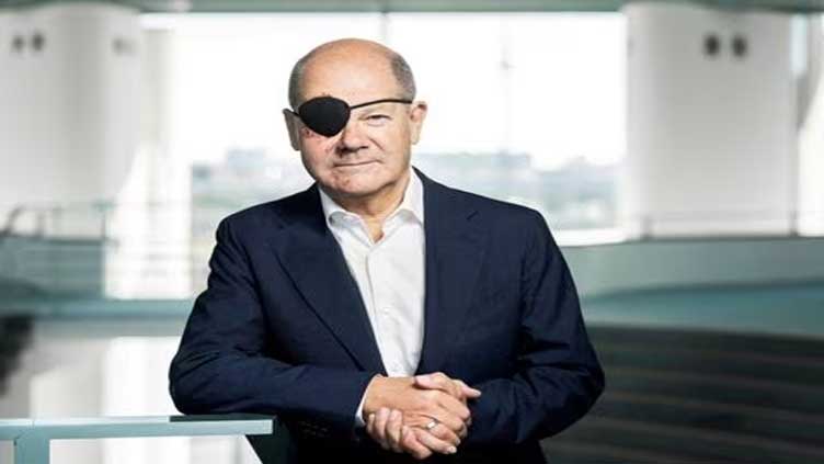 Why German Chancellor Scholz wears eye patch?