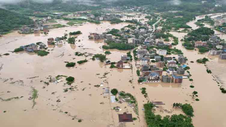 Floods from waning Typhoon Haikui hit transport, force evacuations in China