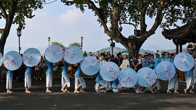 Thousands turn out for launch of Asian Games torch relay in Hangzhou