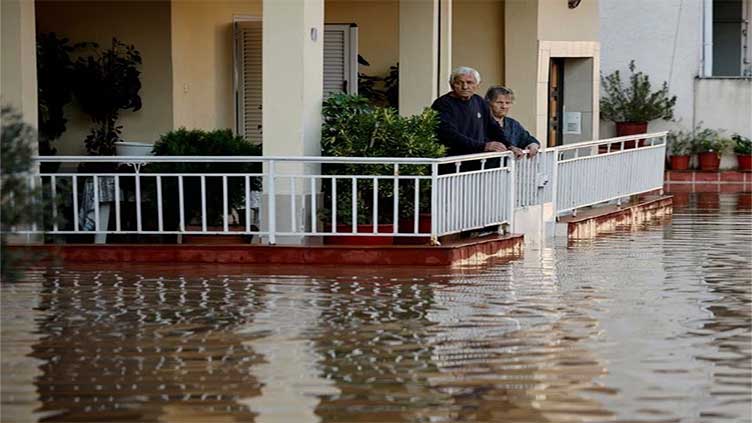 As deadly Greek rainstorm ebbs, trail of devastation emerges