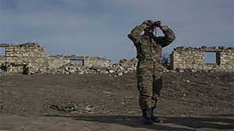 Azerbaijan says Armenian forces fired on its troops