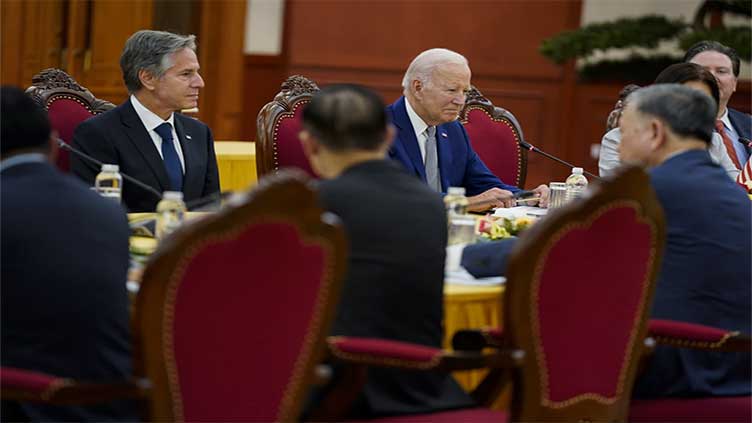 Biden says Vietnam deal is about global stability, not containing China.