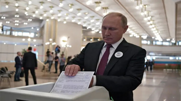 Russian regional vote delivers strong result for Putin amid claims of rigging