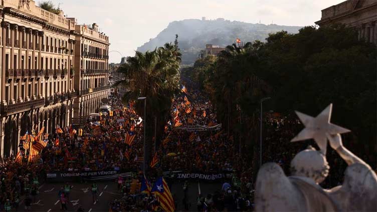 Thousands celebrate Catalonia Day as regional parties become Spain's kingmakers