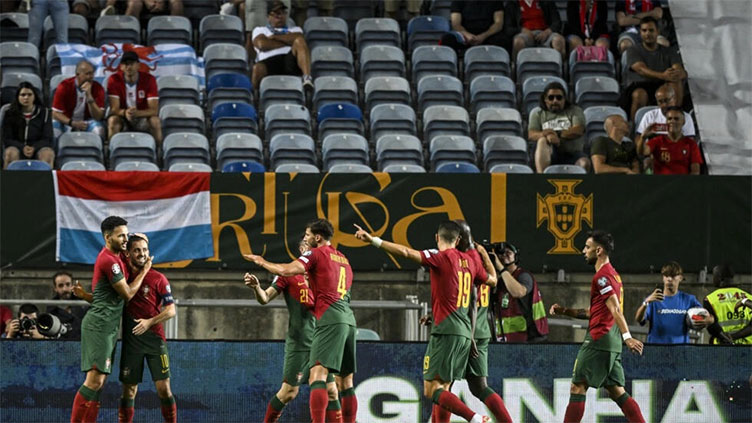 Fernandes shines as Portugal lash Luxembourg in record 9-0 win