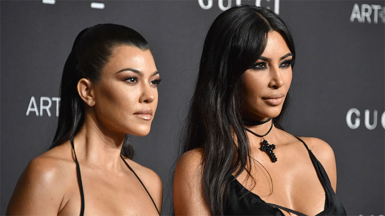 Kim and Kourtney Kardashian are still feuding in 'Kardashians' Season 4 trailer