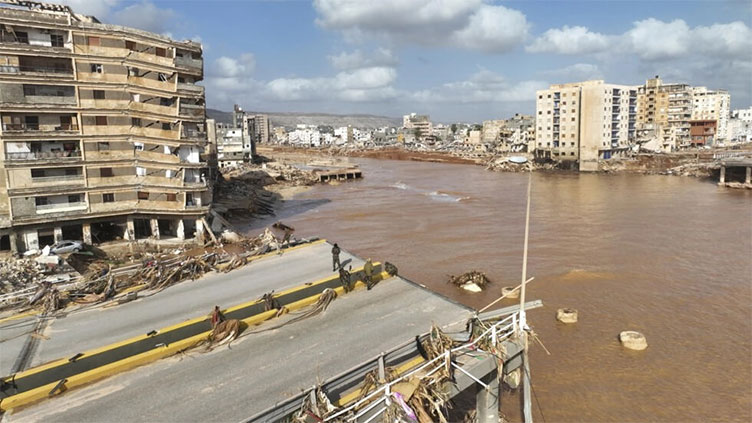 Libyans search for missing relatives after flood devastates city