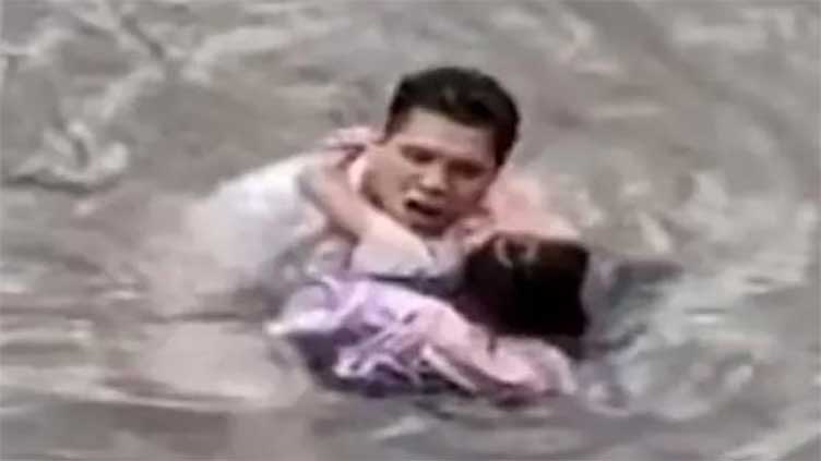 Humanity triumphs as man saves girl from drowning in river