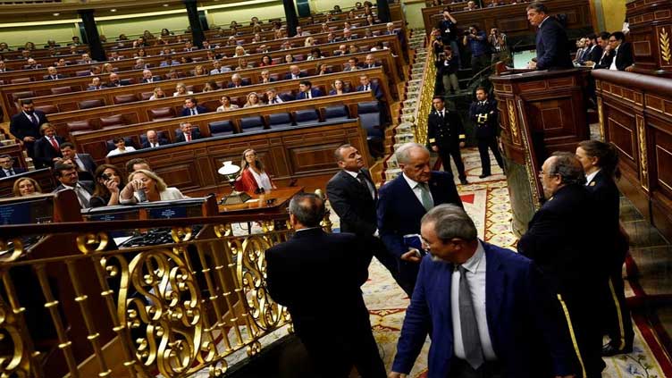 Spain lawmakers use earphones as regional languages make debut in lower house